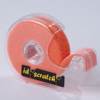 ID-SCRATCH Spenderbox mit 2.5m Rolle des Befestigungsbandes in Orange.